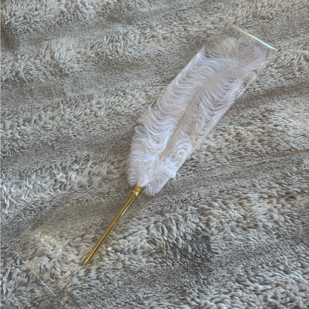 Gold feather pen